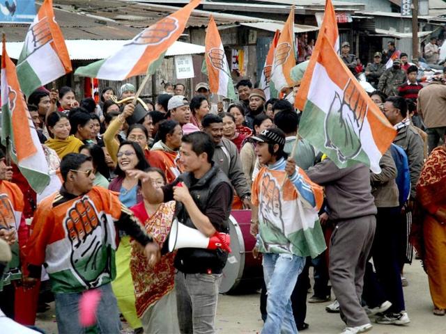 Congress supporters celebrate party's victory in the assembly elections 2012 and absolute majority in Imphal, Manipur. PTI Photo