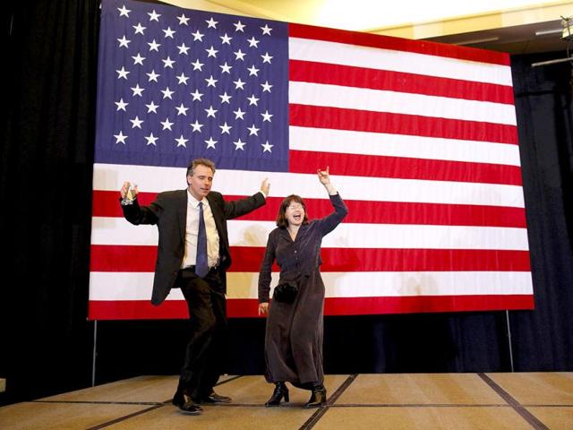 Supporters of Republican US presidential candidate and former Massachusetts governor Mitt Romney, Ellen and Chris Finlay, dance in celebration after Romney was projected as the winner of some of the "Super Tuesday" contests by the television networks, at his "Super Tuesday" primary election night rally in Boston. Reuters/Brian Snyder