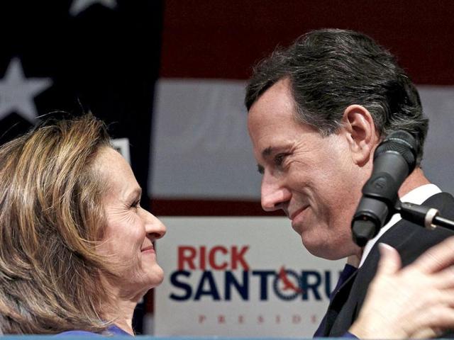 Republican US presidential candidate Rick Santorum (R) smiles at his wife, Karen on stage at his "Super Tuesday" primary election night rally in Steubenville, Ohio. Reuters/Jim Young