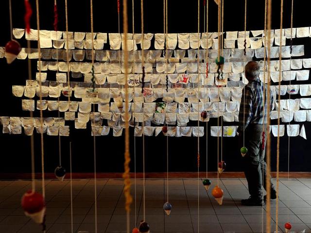A visitor watches "Strokes of Korea", an exhibition by South Korean artists at the National Gallery in San Jose on March 7, 2012. The exhibition is part of the "Museums and Galleries Route" during the XIII International Arts Festival to be held in San Jose from 1 to 25 March. (AFP Photo)