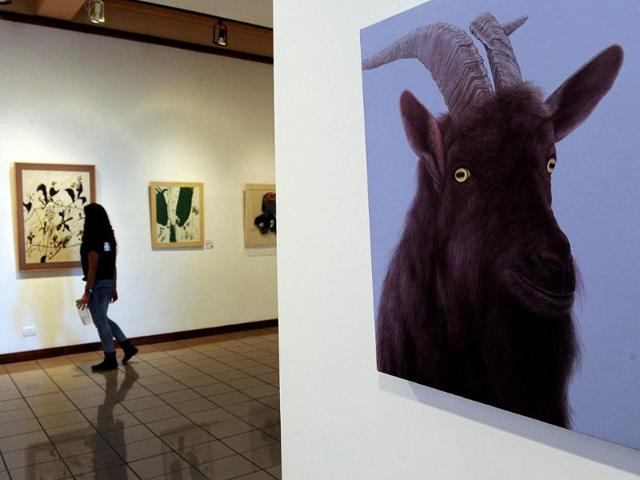 A visitor watches "Strokes of Korea", an exhibition by South Korean artists at the National Gallery in San Jose on March 7, 2012. The exhibition is part of the "Museums and Galleries Route" during the XIII International Arts Festival to be held in San Jose from 1 to 25 March. (AFP Photo)