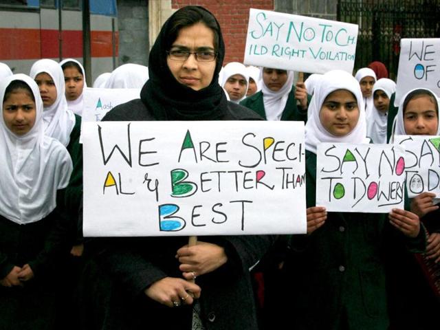Women take part in a rally to mark International Women's Day in Srinagar. PTI/S Irfan