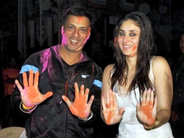 Director Madhur Bhandarkar and actor Kareena Kapoor celebrate Holi on the sets of Heroine in Mumbai on March 8. (PTI Photo)