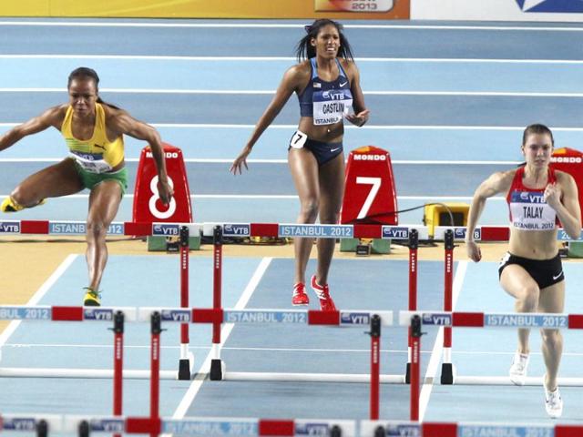 United States' Kristi Castlin reacts after the start of a Women's 60m hurdles first round heat during the World Indoor Athletics Championships in Istanbul. (AP Photo/Michael Probst)