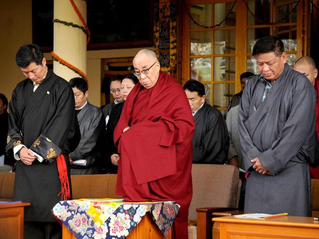 Tibetan-spiritual-leader-the-Dalai-Lama-C-Kalon-Tripa-of-the-Central-Tibetan-Administration-Lobsang-Sangay-L-and-Speaker-of-the-Tibetan-Parliament-in-exile-Penpa-Tsering-R-observe-a-one-minute-silence-to-mourn-the-death-of-Tibetans-due-to-Chinese-crackdowns-in-Tibet-on-the-occasion-of-the-53rd-anniversary-of-the-Tibetan-uprising-day-in-McLeod-Ganj-AFP-Photo-STR Tibetan-spiritual-leader-the-Dalai-Lama-C-Kalon-Tripa-of-the-Central-Tibetan-Administration-Lobsang-Sangay-L-and-Speaker-of-the-Tibetan-Parliament-in-exile-Penpa-Tsering-R-observe-a-one-minute-silence-to-mourn-the-death-of-Tibetans-due-to-Chinese-crackdowns-in-Tibet-on-the-occasion-of-the-53rd-anniversary-of-the-Tibetan-uprising-day-in-McLeod-Ganj-AFP-Photo-STR