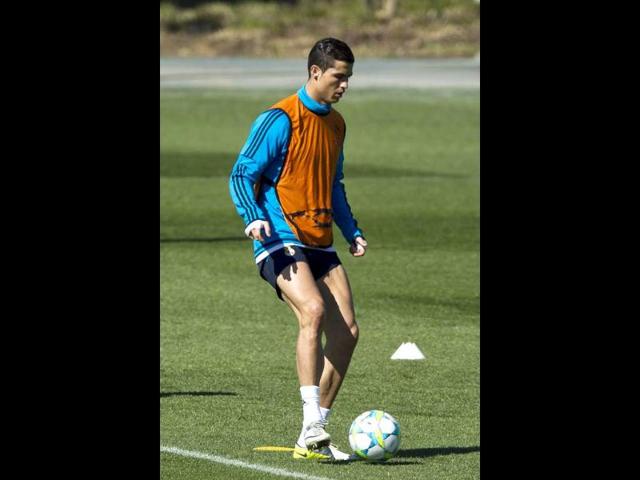 Cristiano Ronaldo kicks the ball during a training session at the Valdebebas stadium, one day ahead of a Champions League round of 16, second leg soccer match against CSKA Moscow, in Madrid. AP/Daniel Ochoa de Olza