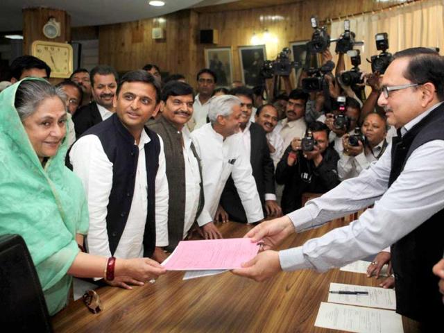 Jaya Bachchan files nomination papers as a Samajwadi Party candidate for Rajya Sabha as chief minister Akhilesh Yadav looks on in Lucknow. (PTI Photo by Nand Kumar)