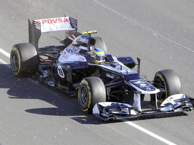 Williams Formula One driver Bruno Senna of Brazil drives back after an incident in the frist corner during the Australian F1 Grand Prix at the Albert Park circuit in Melbourne. Reuters/Scott Wensley