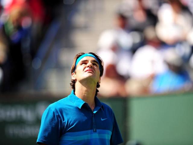 Roger Federer looks up toward the sky during the final of the BNP Paribas Open against John Isner at the Indian Wells Tennis Garden in Indian Wells, California. AFP/Robyn Beck Roger Federer looks up toward the sky during the final of the BNP Paribas Open against John Isner at the Indian Wells Tennis Garden in Indian Wells, California. AFP/Robyn Beck