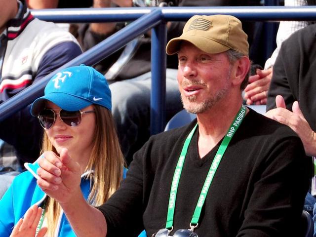 Larry Ellison is recognized by the crowd after the match between Roger Federer of Switzerland and John Isner during the ATP Singles Final at the Indian Wells Tennis Garden in Indian Wells, California. AFP/Harry How Larry Ellison is recognized by the crowd after the match between Roger Federer of Switzerland and John Isner during the ATP Singles Final at the Indian Wells Tennis Garden in Indian Wells, California. AFP/Harry How