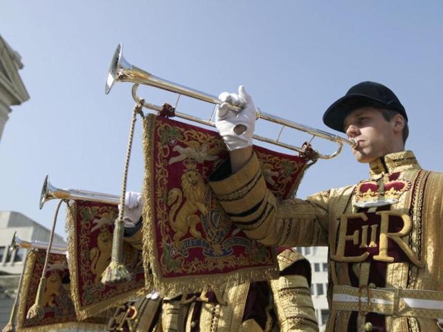 State trumpeters of the Household Cavalry are seen dressed in their summer uniforms, during a media viewing at Wellington Barracks showing uniforms that will be worn for the Queen's Diamond Jubilee celebrations, London. Reuters/Olivia Harris