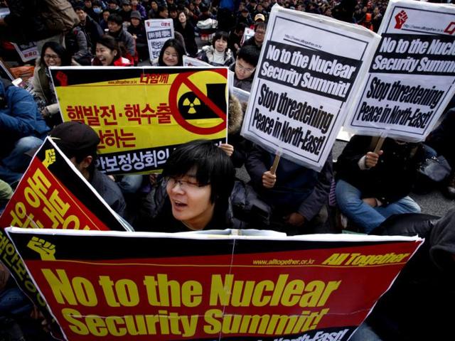 Protesters hold pickets during a rally opposing the Nuclear Security Summit in Seoul. Leaders from more than 50 countries, including US President Barack Obama, will gather in Seoul, for a March 26-27 nuclear security summit focusing on measures to protect nuclear materials and facilities and to prevent illicit trafficking. REUTERS/Bobby Yip