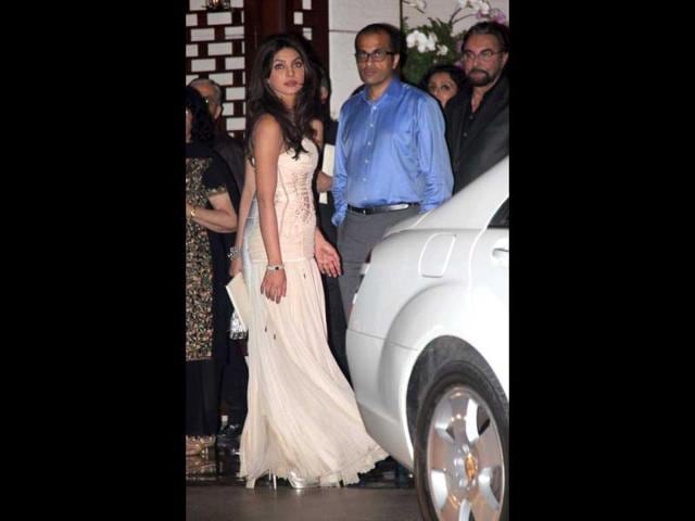 Priyanka Chopra looks average in her white dress.