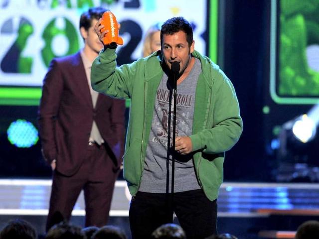 Adam Sandler accepts the award for favorite movie actor for Jack And Jill at the Nickelodeon 25th Annual Kids' Choice Awards in Los Angeles. AP/Chris Pizzello