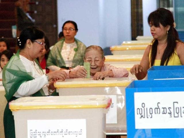 A Myanmar woman casts her vote at a polling station at Mingala Taungnyunt Township, Yangon. AP