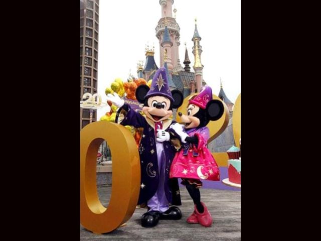 Disney characters Mickey and Minnie pose during the launch of the 20th birthday celebrations of Disneyland park in Chessy, near Marne-la-Vallee, outside Paris. AFP/Thomas Samson