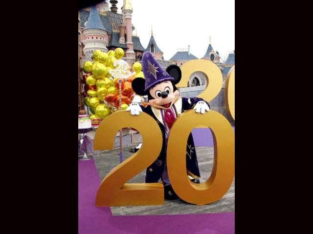Disney character Mickey poses during the launch of Disneyland Paris's 20th birthday celebrations at Disneyland Park in Chessy, near Marne-la-Vallee, outside Paris. AFP/Thomas Samson