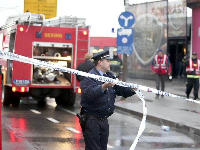 A policeman secures the area after a fire in Novi Sad, about 80 km (50 miles) north of Belgrade. Six youths, three women and three men, lost their lives following a fire that broke out in the city's Contrast night club, local media reported. REUTERS/Stringer