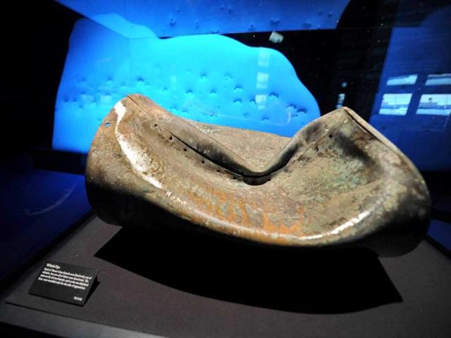 A whistle pipe recovered from Titanic is seen at an exhibition at the Marina Bay Sands ArtScience Museum in Singapore. The exhibition features about 275 artifacts recovered where 14 of which have never been seen before with realistic re-creation and personal stories of the maiden voyage which sank in 1912. (AFP Photo)