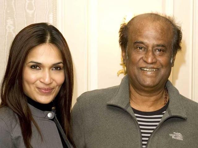 Rajinikanth and daughter Soundarya pose for the cameras. Rajinikanth and daughter Soundarya pose for the cameras.