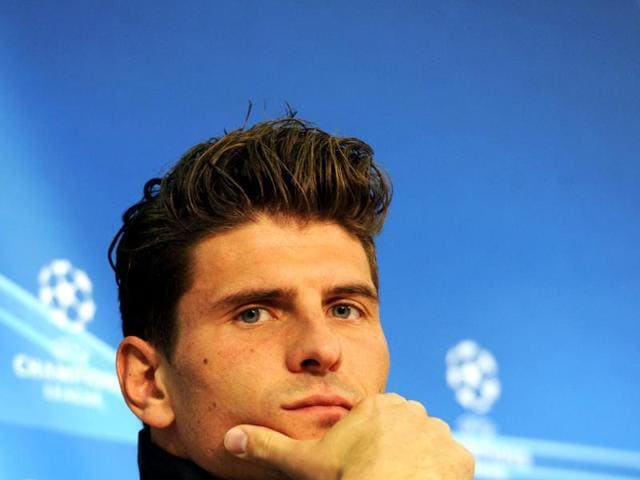 Bayern Munich striker Mario Gomez attends a news conference on the eve of their UEFA Champions League quarter final second leg match against Olympique de Marseilles in the arena in Munich, southern Germany. AFP Photo/Christof Stache