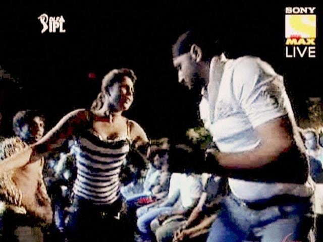 Mumbai Indians captain Harbhajan Singh (R) dances with actress Priyanka Chopra during the opening ceremony of the 5th edition of Indian Premier League in Chennai. PTI/TV grab