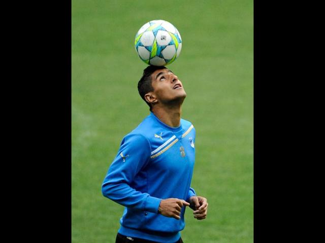 APOEL's forward Ailton controls a ball during a training session at the Santiago Bernabeu Stadium in Madrid on the eve of the UEFA Champions League second leg quarter-final football match against Real Madrid. AFP/ Dani Pozo