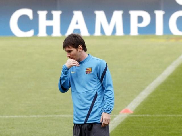 Barcelona's Lionel Messi gestures during a training session at Nou Camp stadium in Barcelona. Reuters/Gustau Nacarino
