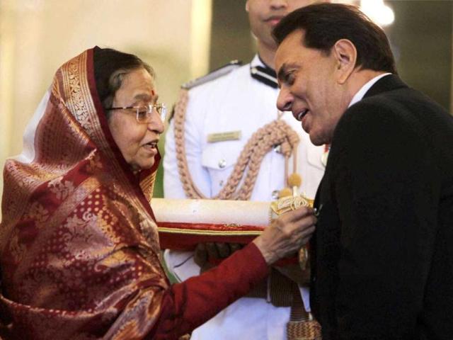 President of India Pratibha Patil confers the title of Padma Bhushan upon actor Dharmendra.