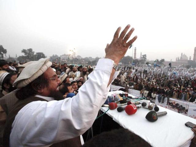 Hafiz Saeed speaks to gathering during an anti-American and Indian rally on the grounds of the Minar-e-Pakistan in Lahore December 18, 2011. About 30,000 Islamists staged a protest on Sunday to condemn the United States and show support for Pakistan's military, which has reasserted itself after a cross-border Nato attack and a controversial memo that has weakened the civilian government. Reuters/Mohsin Raza