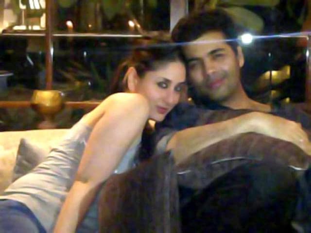Karan Johar tweeted this picture with Bebo. All you can notice is Kareena's right arm.