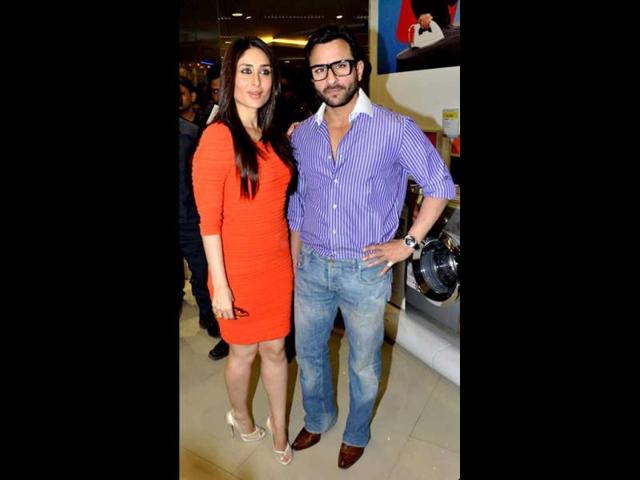 Kareena Kapoor poses with Saif Ali Khan at Agent Vinod's promotional event. We doubt if the figure hugging dress is working for her.