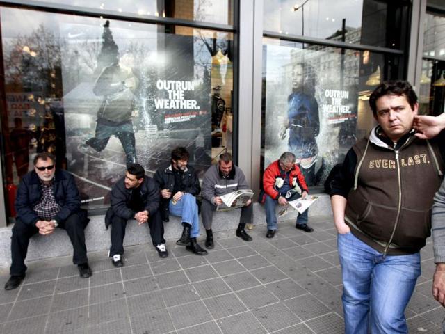 Shipyard workers take part in a protest against high unemployment rate in their sector, in Athens. Greece's jobless rate rose to 20.7 % in the fourth quarter of 2011 from 17.7 % in the previous three-month period as economic activity slumped, the country's statistics service said. REUTERS/John Kolesidis