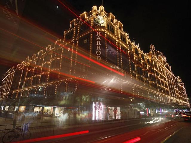 A bus passes in front of Harrods department store in Knightsbridge, central London. Reuters/Andrew Winning, Files