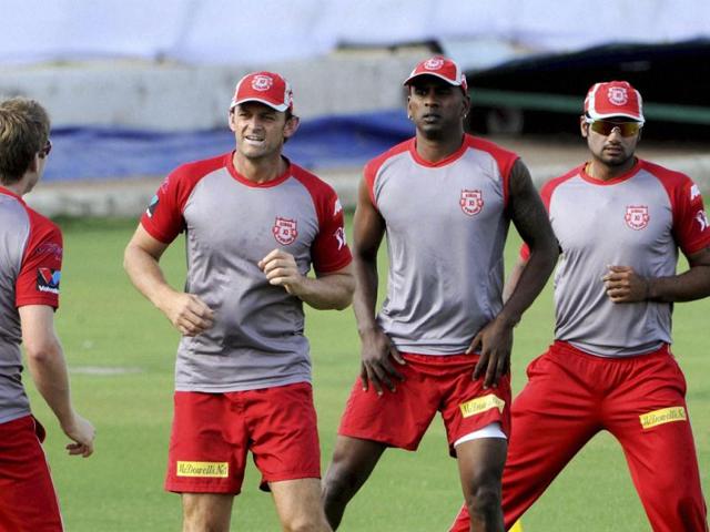 Kings XI Punjab captain Adam Gilchrist with other players during a practice session in Jaipur. PTI photo