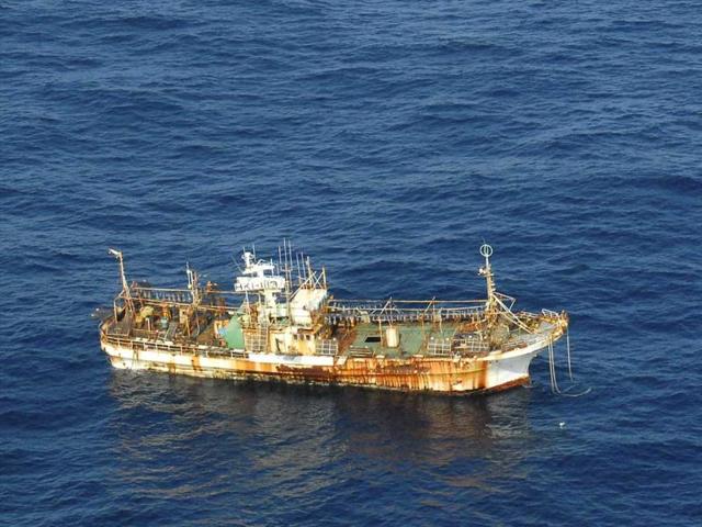 The unmanned Japanese fishing vessel, Ryou-un Maru, drifts northwest approximately 164 miles southwest of Baranof Island, in the Gulf of Alaska, in this US Coast Guard handout photo. The vessel was set adrift by the tsunami that struck Japan in 2011. (Reuters)