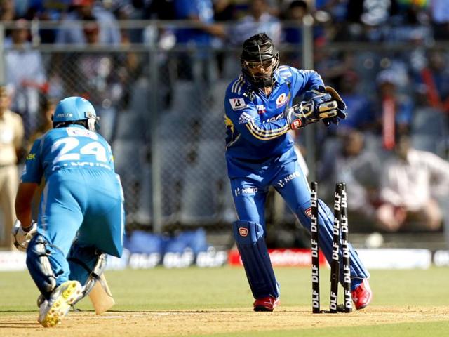 Mumbai Indians player Dinesh Karthik stumps Pune Warriors captain Sourav Ganguly during their match at Wankhede Stadium. HT/Kunal Patil