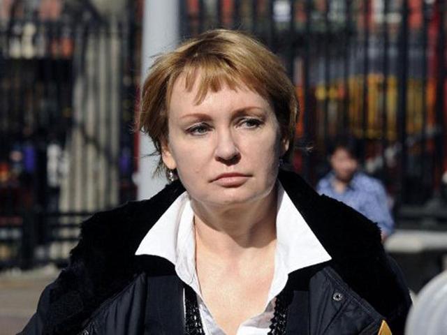 Alla Bout, wife of Viktor Bout, enters US Federal Court for her husband's sentencing in New York. Bout was convicted of conspiring to sell millions of dollars worth of weapons, including antiaircraft missiles, to Colombian terrorists who were targeting Americans. AFP PHOTO/STEPHEN CHERNIN