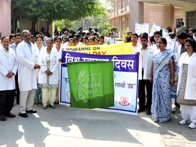 To spread awareness amongst people about health issues, the doctors of PGIMS in Rohtak on World Health Day, organised an awareness drive. HT Photo by Manoj Dhaka