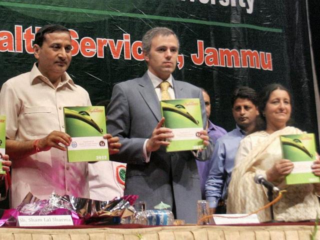 Jammu and Kashmir chief minister Omar Abdullah releases a book during a function organised to mark the World Health Day 2012 in Jammu. PTI