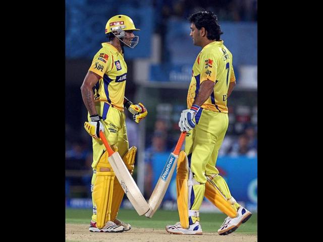 Chennai Super Kings captain MS Dhoni and RA Jadeja during their IPL-5 match against Deccan Chargers in Visakhapatnam. (PTI Photo/Ashok Bhaumik)