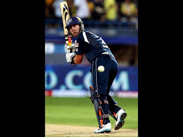 Deccan Chargers Cameron White plays a shot against Chennai Super Kings during their IPL-5 match in Visakhapatnam. (PTI Photo/Ashok Bhaumik)