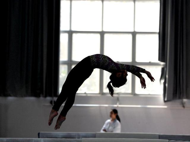 Young Chinese gymnasts train at a special sport school in Hefei, east China's Anhui province. Potential gymnasts embark on a gruelling schedule which aims to create champions. AP Photo