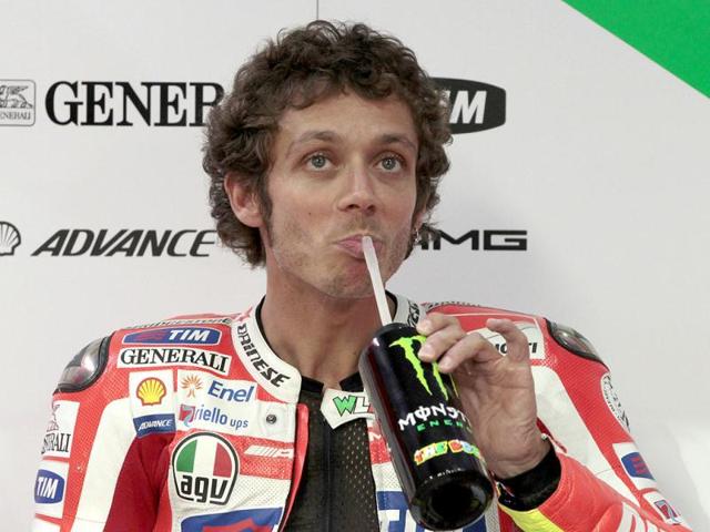 Valentino Rossi of Italy drinks before the qualifying session at the Qatar MotoGP Grand Prix at Losail International Circuit in Doha. Reuters