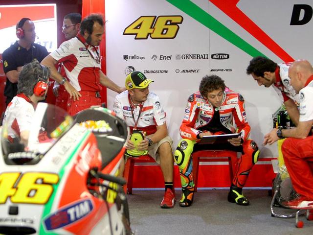 Ducati's Valentino Rossi of Italy waits to take part in the qualifying practice session at the Losail International Circuit in Doha. AFP