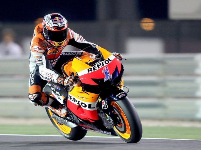Australia's Casey Stoner of the Repsol Honda Team in action during the qualifying session of the Qatar MotoGP at Losail circuit in Doha, Qatar. AP