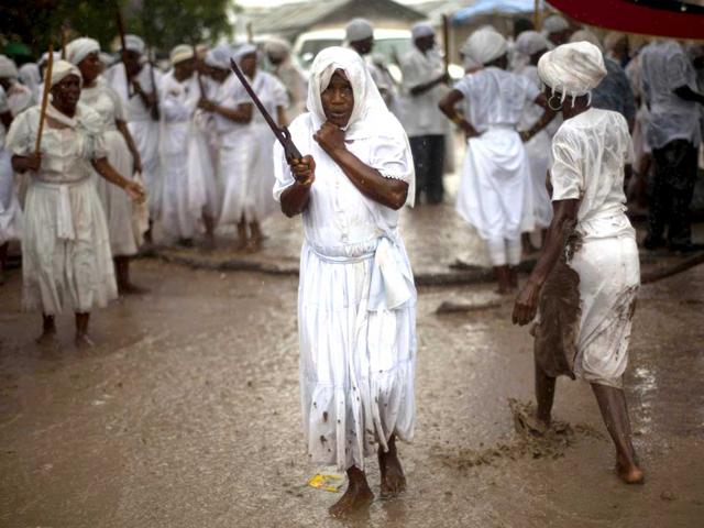 Hundreds of voodoo followers travel to Souvenance over Easter weekend to show their devotion to the spirits. Voodoo was brought to Haiti by slaves from West Africa and is one of Haiti's three recognized religions. AP Photo/Ramon Espinosa