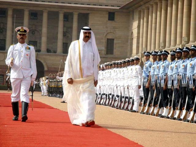 Emir of the State of Qatar, Sheikh Hamad Bin Khalifa Al-Thani inspects a guard of honour during a ceremonial reception at Rashtrapati Bhavan in New Delhi.
