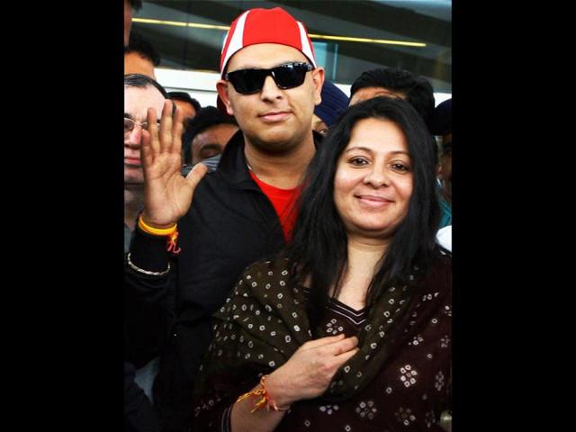 Yuvi was received by his mother Shabnam at the Indira Gandhi International Airport in New Delhi. PTI Photo by Kamal Kishore