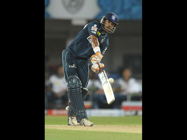 Deccan Chargers batsman Shikar Dhawan plays a shot during the IPL match at Dr YS Rajasekhara Reddy Cricket Stadium in Visakhapatnam. (AFP Photo)